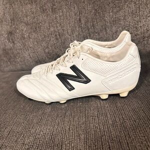 New Balance men’s size 7.5 white and black cleats